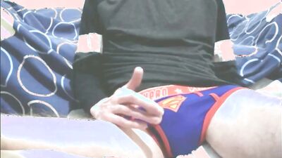 Amateur high school chap is teasing his pecker in the bedroom