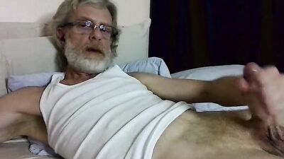 Bearded stepdad is jerking off in front of the camera