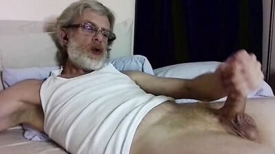 Bearded stepdad is jerking off in front of the camera