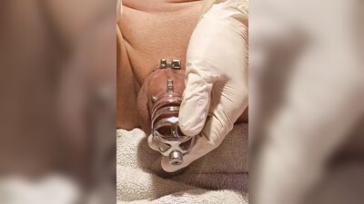 Perverted gay chap plays with his pecker with a gloves on