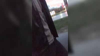 Perverted bloke is flashing and stroking his cock in public