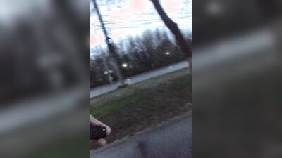 Perverted bloke is flashing and stroking his cock in public