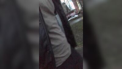Perverted bloke is flashing and stroking his cock in public