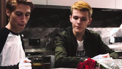 Skinny gay chap is riding his lover's hard cock on the couch