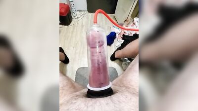 Amateur gay bloke is pumping his prick with his toy