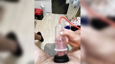 Amateur gay bloke is pumping his prick with his toy