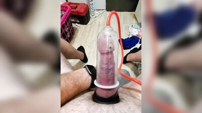 Amateur gay bloke is pumping his prick with his toy