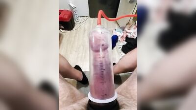 Amateur gay bloke is pumping his prick with his toy