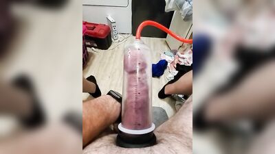 Amateur gay bloke is pumping his prick with his toy