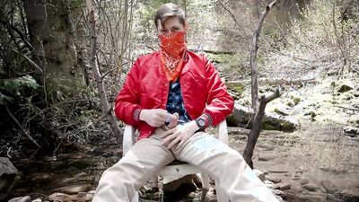 Amateur masked cap is stroking his pecker deep in the forest
