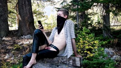 Skinny masked bloke is having some fun inside the forest