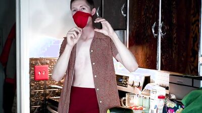 Masked teen enjoys in his solo performance inside the kitchen