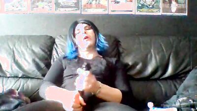 Masked femboy strokes his toy in front of the camera
