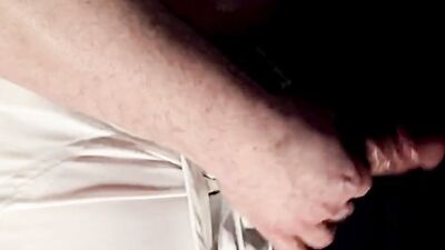 Oiled chubby bloke is masturbating in front of the camera
