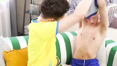 Skinny twins are barebacking on the couch in this hot scene