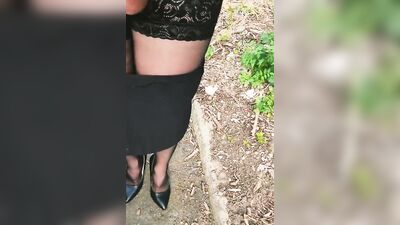 Amateur femboy is stroking his big dick in the public