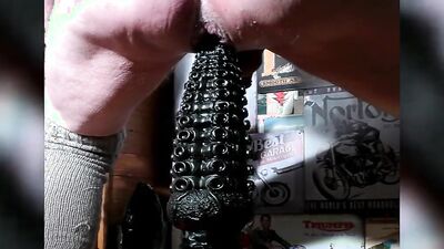 Perverted guy is destroying his tight ass with a monster dildo