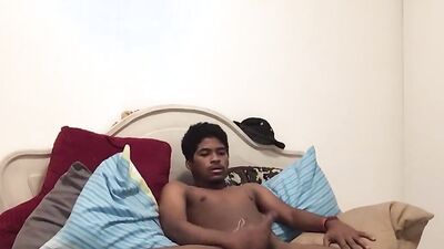Amateur Latino is enjoying in his solo performance in the bedroom