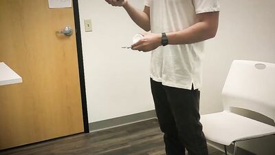 Bearded chap is stroking his hard prick inside the sperm bank