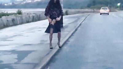 Amateur femboy is flashing his pecker while walking in public