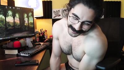 Mustache bloke is stroking his prick with a rubber ring