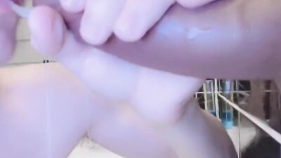 Cute teen is riding a gummy toy in front of the camera
