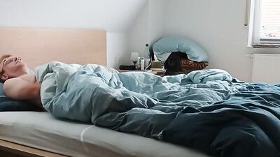 Perverted gay dude is rubbing his cock on a bed