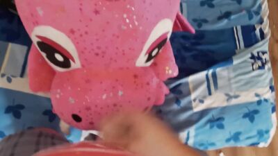 Lad rubs his hard willy on a cute pinky dinosaur