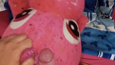 Lad rubs his hard willy on a cute pinky dinosaur