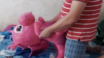 Lad rubs his hard willy on a cute pinky dinosaur