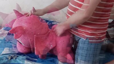 Lad rubs his hard willy on a cute pinky dinosaur