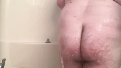 Amateur bear is playing with his tiny pecker inside the shower