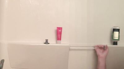 Amateur bear is playing with his tiny pecker inside the shower