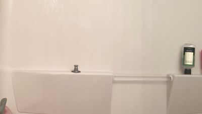Amateur bear is playing with his tiny pecker inside the shower