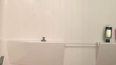 Amateur bear is playing with his tiny pecker inside the shower