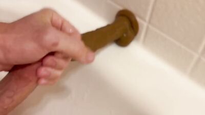 Amateur gay bloke is jerking a dildo with his feet