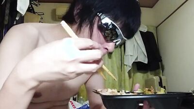 Amateur Japanese guy is eating in front of the camera