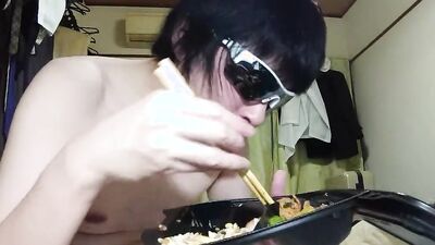 Amateur Japanese guy is eating in front of the camera