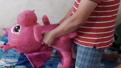 Lad rubs his hard pecker on a pinky dragon toy