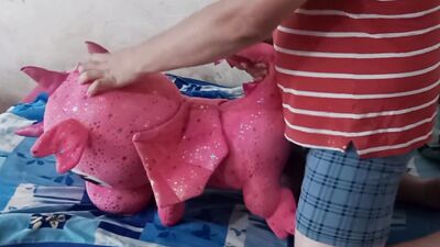 Lad rubs his hard pecker on a pinky dragon toy
