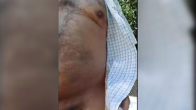 Chubby amateur stepdad is jerking his pecker out in the open