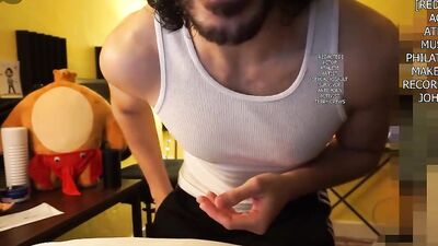 Handsome gay bloke is having fun in front of the camera