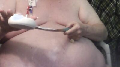 Amateur fat chap is enjoying in his performance in front of the cam