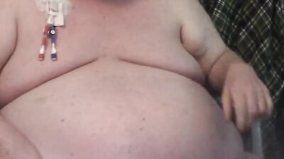 Amateur fat chap is enjoying in his performance in front of the cam