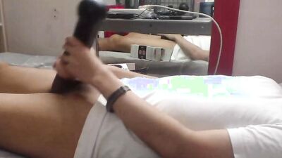 Amateur twink is stroking a cock with a big gummy cherry