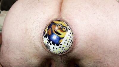Load shoves a ball deep down his tight fuck hole