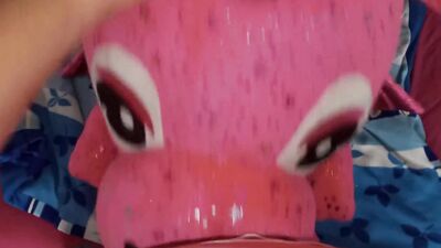 Perverted fellow is rubbing his hard willy on a cute pinky toy