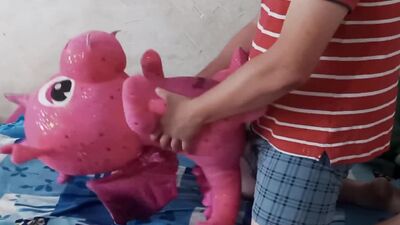 Perverted fellow is rubbing his hard willy on a cute pinky toy