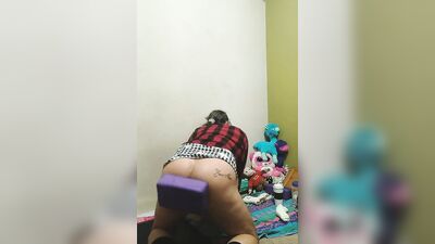 Longhaired bloke bends and gets his hole stretched with a toy
