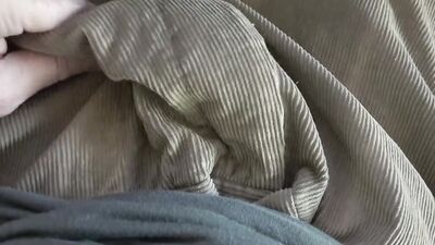 Close-up video of chap stroking his prick with a condom on